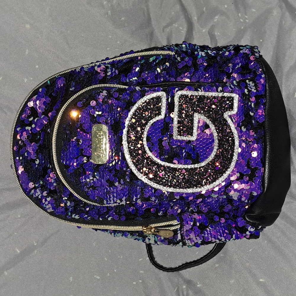 This is a Justice "G" Initial Small Blue Bookbag!
